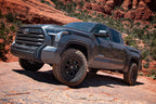 ICON 22+ Toyota Tundra 2.5 EXP Front Coilover Shock on offroad terrain