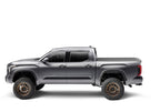 BAK 2022+ Toyota Tundra 5.5ft Bed Revolver X4S Bed Cover installed on a lifted truck with offroad wheels.
