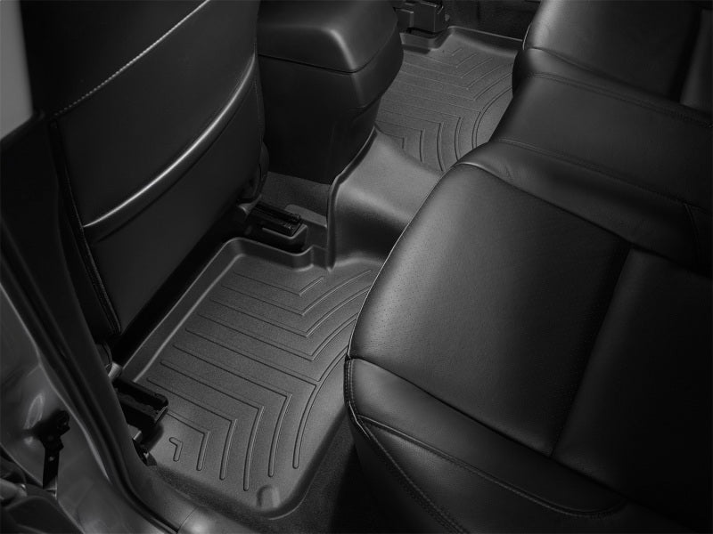 WeatherTech 04+ Mazda 3 Rear FloorLiner - Black interior fit.