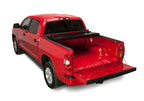 BAK 2024 Toyota Tacoma 5ft Bed BAKFlip Fibermax Bed Cover on red truck