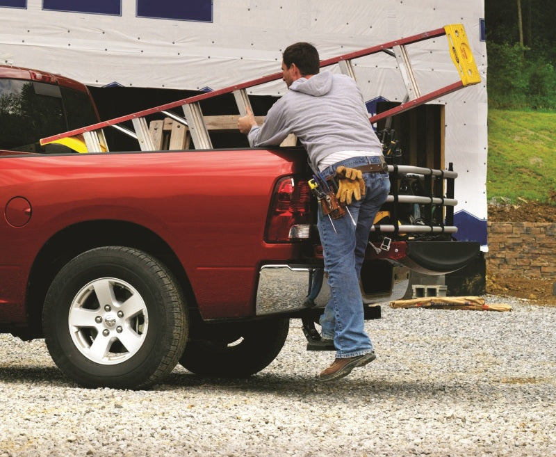 AMP Research 2009-2017 Dodge Ram 1500 BedStep - Black in use for easy loading