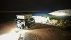 Rigid Industries 360-Series 9in LED Off-Road Drive Beam - RGBW illuminating camping setup
