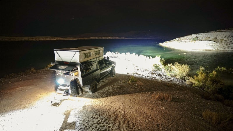 Rigid Industries 360-Series 9in LED Off-Road Drive Beam - RGBW illuminating camping setup