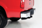 AMP Research 1999-2016 Ford F-250/350/450 BedStep - Black installed on truck rear bumper