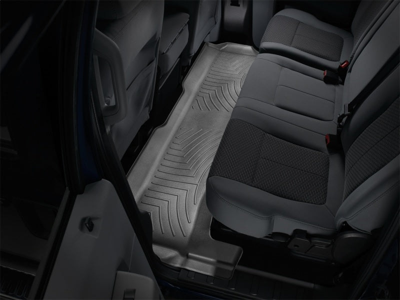 WeatherTech 11+ Ford F250/F350/F450/F550 Rear FloorLiner - Black in truck interior