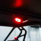 KC HiLiTES Dual Cyclone Dome Light Mount for Roll Cages in red light