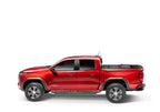 BAK 2024 Toyota Tacoma 6ft Bed BAKFlip MX4 Bed Cover on red truck