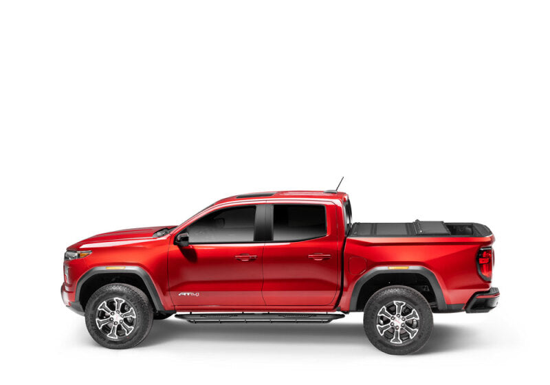 BAK 2024 Toyota Tacoma 6ft Bed BAKFlip MX4 Bed Cover on red truck