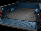 WeatherTech 05-13 Toyota Tacoma TechLiner - Black installed in truck bed.