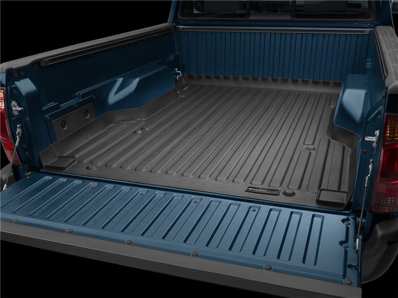 WeatherTech 05-13 Toyota Tacoma TechLiner - Black installed in truck bed.