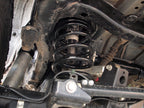 ICON 2007+ Toyota FJ / 2003+ Toyota 4Runner Rear 3in Dual Rate Spring Kit installed view, part of offroad performance upgrades.