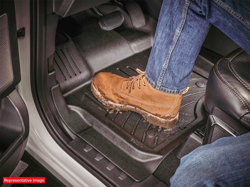 WeatherTech 17-19 Ford F250/F350/F450/F550 Reg. Cab Front FloorLiner HP - Black with shoe on it.