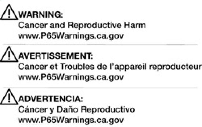 Warning labels for cancer and reproductive harm in English, French, and Spanish.