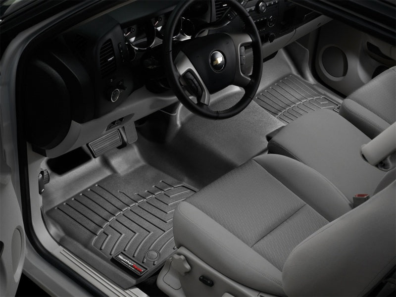 WeatherTech 07-13 GMC Sierra Front FloorLiner - Black in vehicle interior