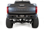 Addictive Desert Designs 22-23 Toyota Tundra Stealth Fighter Winch Rear Bumper on offroad truck with upgraded tires and suspension.