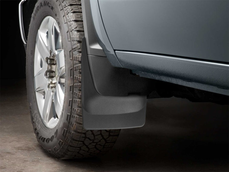 WeatherTech 20-24 Chevrolet Silverado 2500HD/3500HD Front No Drill Mudflaps - Black on truck tire