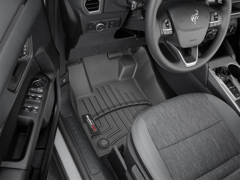 WeatherTech 2021+ Ford Bronco Sport (w/o Rubberized Floor)/2022 Ford Maverick Front FloorLiner - Blk installed in vehicle interior.