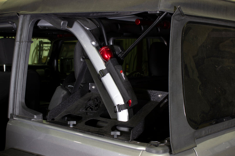 Fishbone Offroad Roll Bar Flashlight Holder installed in truck