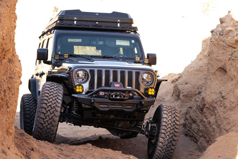 DV8 Offroad 18-23 Wrangler JL/Gladiator JT Spec Series Front Bumper on off-road terrain
