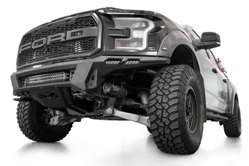Addictive Desert Designs17-20 Ford F-150 Raptor Phantom Front Bumper with offroad tires and performance upgrades