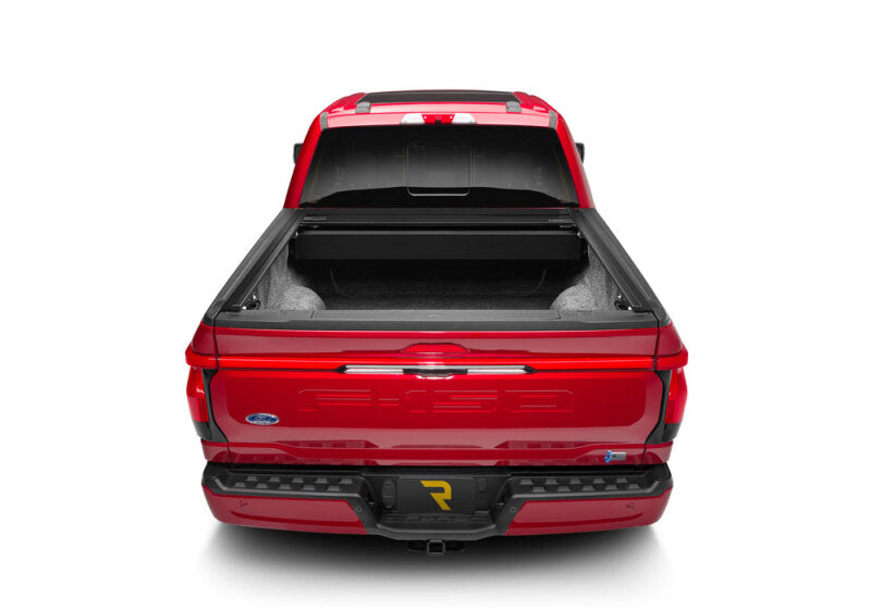 Retrax 21-22 Ford F-150 Super Crew/Super Cab (Incl. 2022 Lightning) 5.5ft Bed RetraxPRO MX installed on red truck.