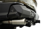 Addictive Desert Designs2024+ Ford Ranger Raptor Phantom Rear Bumper close-up with tow hitch and exhaust.