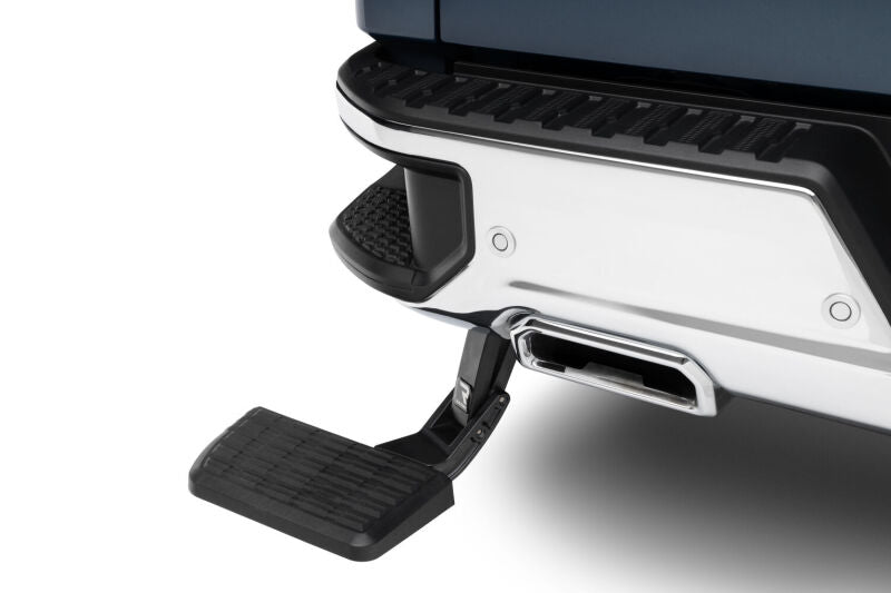 AMP Research 19-22 Chevrolet/GMC Silverado/Sierra 1500 BedStep - Black mounted on truck bumper