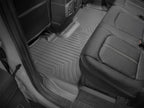 WeatherTech 2017+ Ford F-250/F-350/F-450/F-550 Crew Cab Rear FloorLiner - Black installed in truck interior.