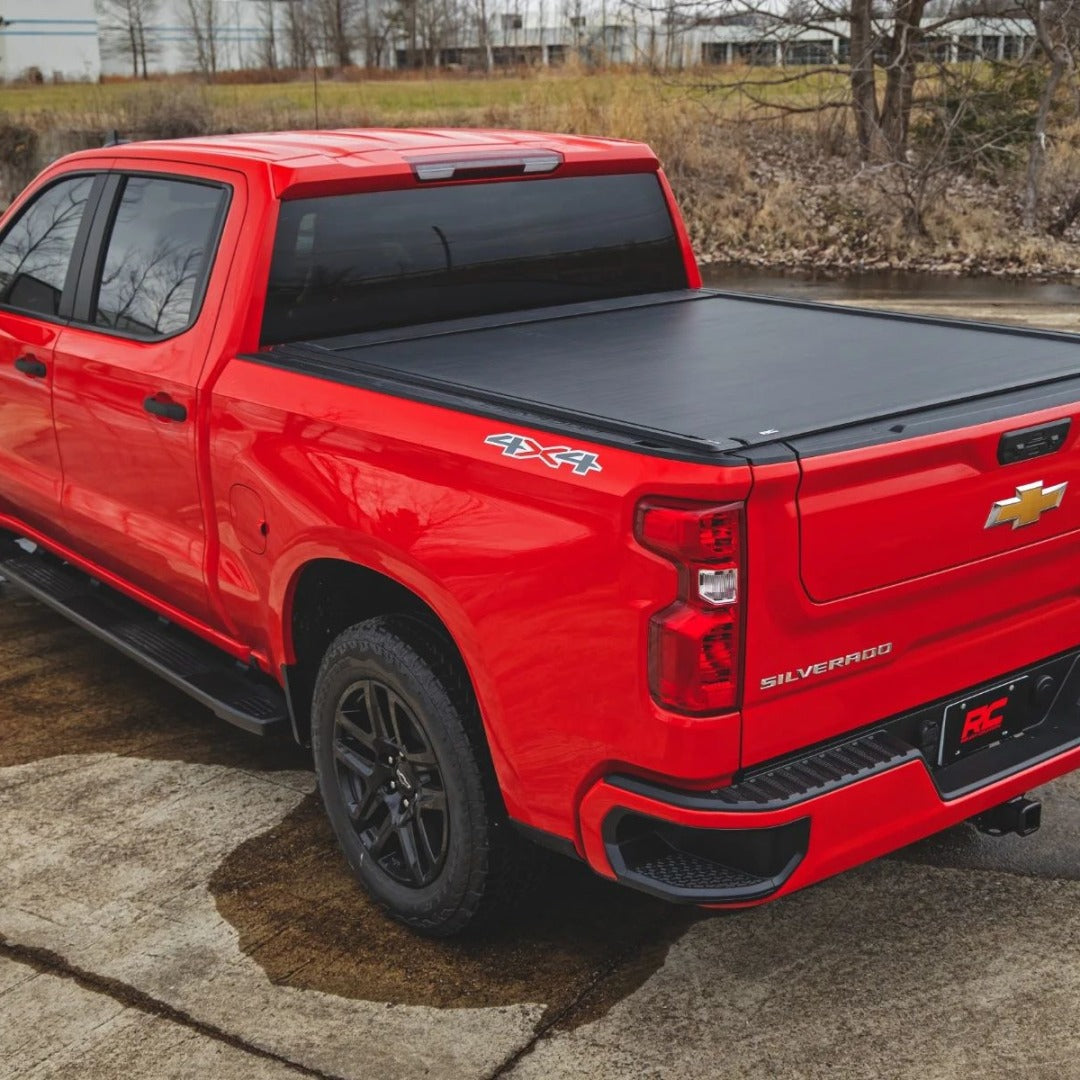 Red Chevrolet Silverado with offroad features and accessories