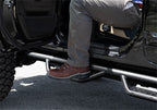 N-Fab RS Nerf Step 18-19 Jeep Wrangler JL 4DR - Full Length - Tex. Black with a person stepping on it.