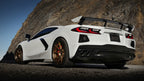 Borla 2020 Chevrolet Corvette C8 6.2 ATAK 3in Exhaust System Dual Round Rolled A/C Black Chrome Tips on white sports car.