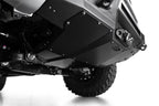 Addictive Desert Designs 2024 Toyota Tacoma Stealth Center Mount Winch Front Bumper with skid plate and offroad wheels.