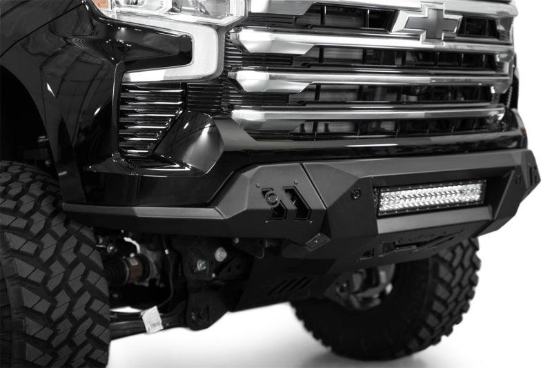 Addictive Desert Designs2022+ Chevrolet Silverado 1500 Black Label Front Bumper with LED light bar and rugged design.