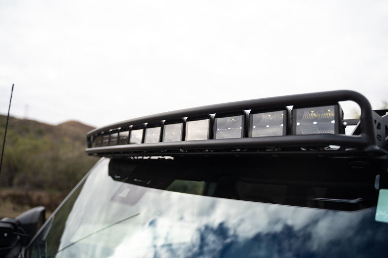 DV8 21+ Ford Bronco Curved Light Bracket for 12 3in. Pod Lights mounted on windshield, enhancing offroad lighting.