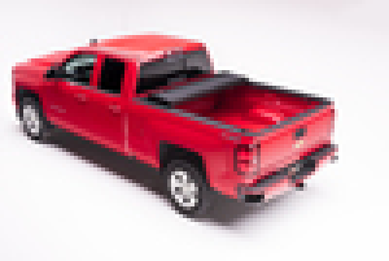 BAK 2014 Chevy Silverado 1500 / 15-20 Chevy Silverado 2500/3500 8ft Bed BAKFlip MX4 Matte Finish on red truck.