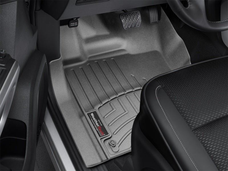 WeatherTech 2016+ Nissan Titan XD Front FloorLiners - Black in truck interior