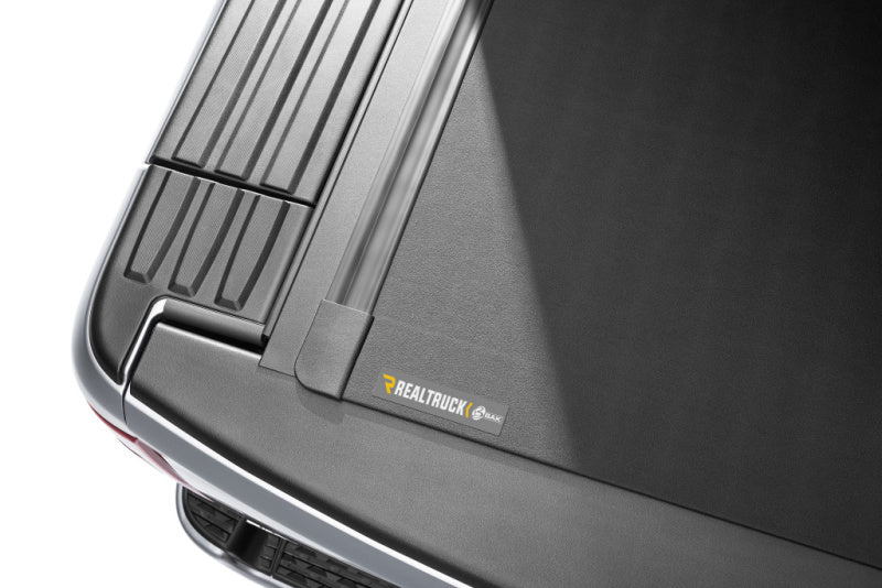 BAK 19-21 Dodge Ram w/ Ram Box Revolver X4s 5.7ft Bed Cover close-up view, featuring durable matte black finish.