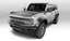 Bushwacker 2021+ Ford Bronco 4-Door Extend-A-Flares 4pc - Black on a silver Bronco