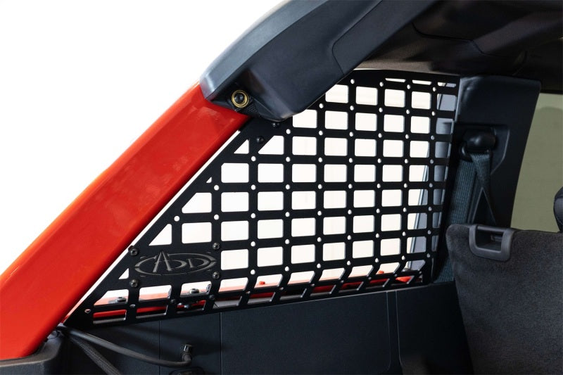 Addictive Desert Designs21-23 Ford Bronco & Bronco Raptor Rear Window Molle Storage Panels installed in vehicle.