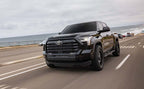MagnaFlow 22+ Toyota Tundra Street Series 3in Dual Driver Side Rear Cat-Back Exhaust on a black truck driving
