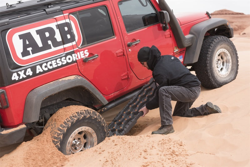 ARB Tred Pro Red recovery board used in off-road rescue