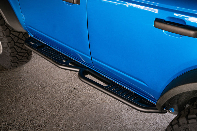 DV8 Offroad 21-22 Ford Bronco OE Plus Series Side Steps on blue truck