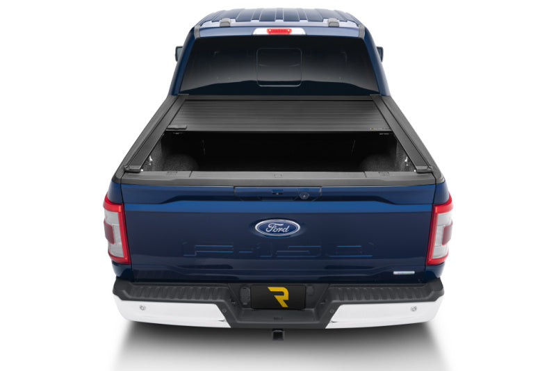 Retrax 21-22 Ford F-150 Super Crew/Super Cab (Incl. 2022 Lightning) 5.5ft Bed RetraxPRO XR installed on a blue Ford truck.