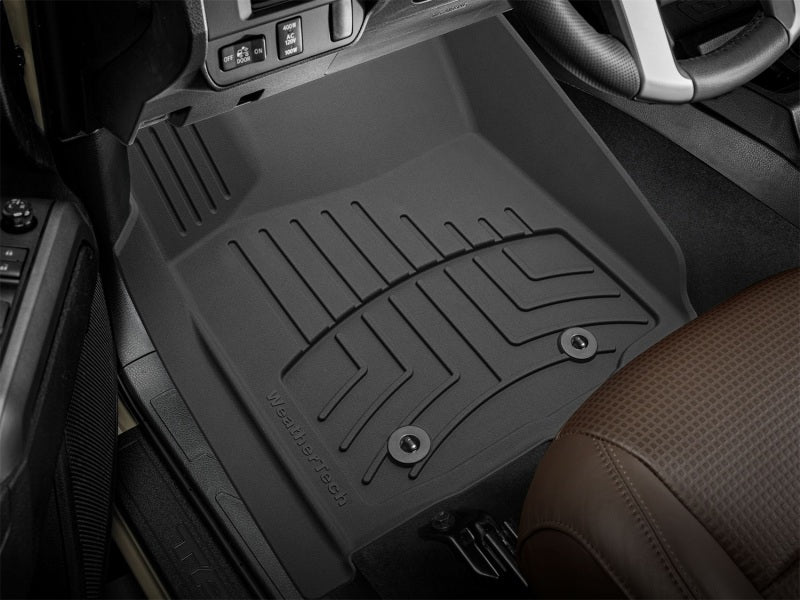 WeatherTech 18-20 Toyota Tacoma Front FloorLiner HP - Black in vehicle interior