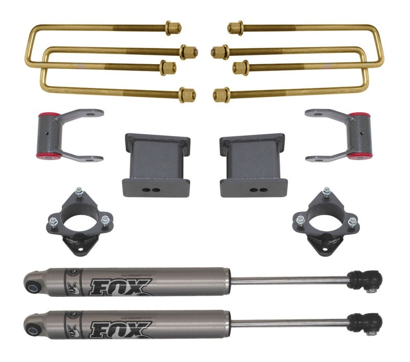 MaxTrac 07-16 GM C1500 2WD w/Cast Steel Susp. 4in Rear Lift Kit components including shocks and brackets. Main image