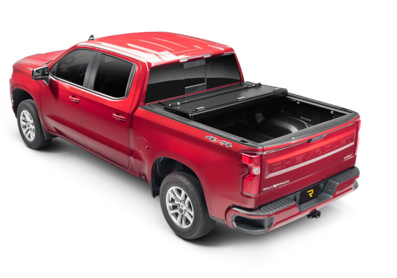 BAK 88-14 Chevy Silverado & C/K 8ft Bed (2014 HD / 2500 / 3500) BAKFlip G2 on red truck with cover.