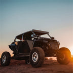 Rigid Industries Revolve 10in Bar w/Amber Trim Ring on offroad vehicle