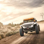 KC HiLiTES Gravity Titan LED 6in. - Pair Pack (Spot Beam) on Jeep Wrangler off-road driving.