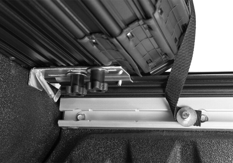 Detail of BAK 19-21 Dodge Ram w/ Ram Box Revolver X4s 5.7ft Bed Cover mechanism, showcasing durability and design features.