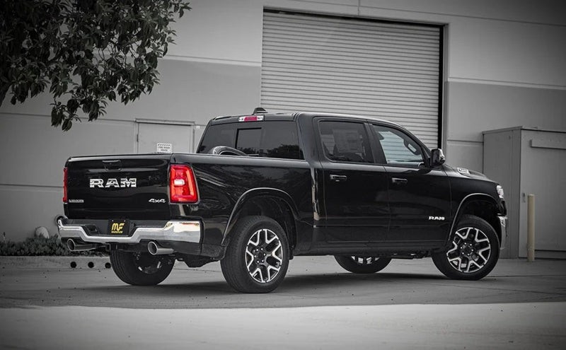 Magnaflow 25+ Ram 1500 I6 3.0L SPEQ Series Polished Cat-Back Performance Exhaust System installed on a black RAM truck.